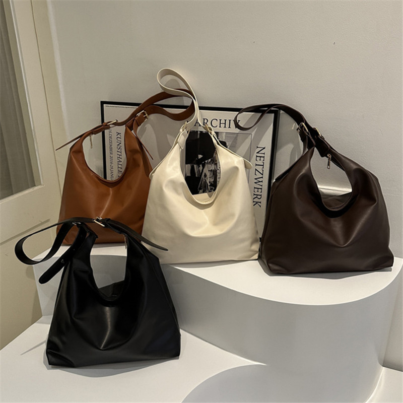 Elegancka czarna skórzana tore – Leatherwork Workshop recenzja i cena